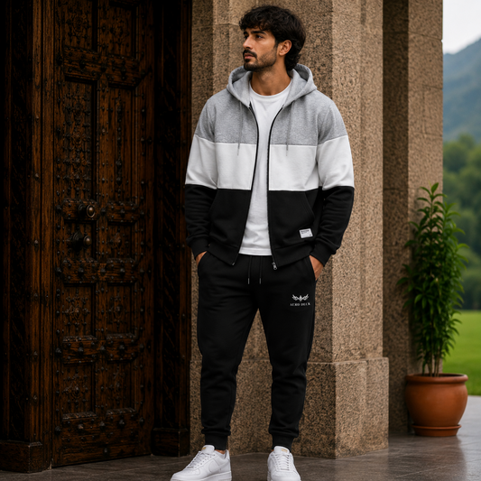 AERODECK APPARELS grey white and black colorblock zip hoodie and black trousers tracksuit set worn by a model