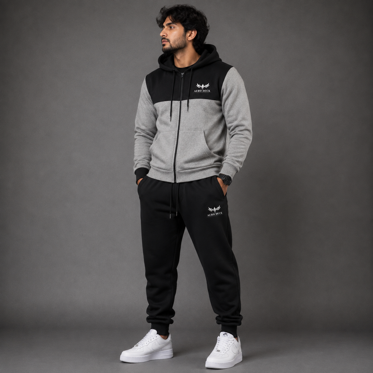 Aero Deck men's black and grey colorblock zip hoodie tracksuit set worn by model